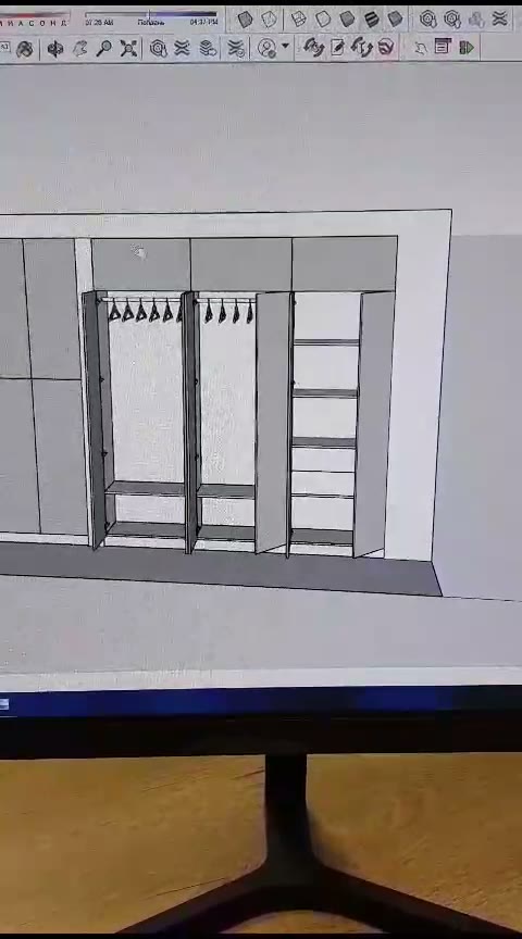 3D-эскиз встроенного шкафа-купе в SketchUp: секции со штангой для одежды, полками и выдвижными ящиками, монитор на столешнице